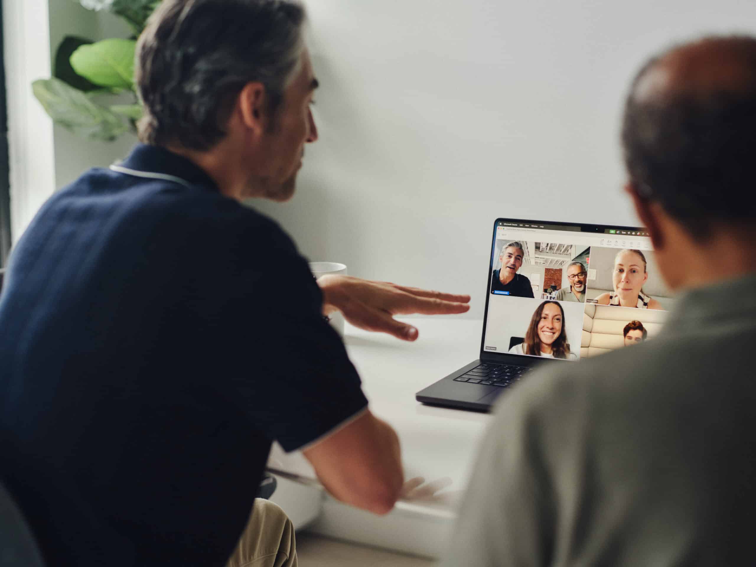Capability visual Two men talking on video conference call